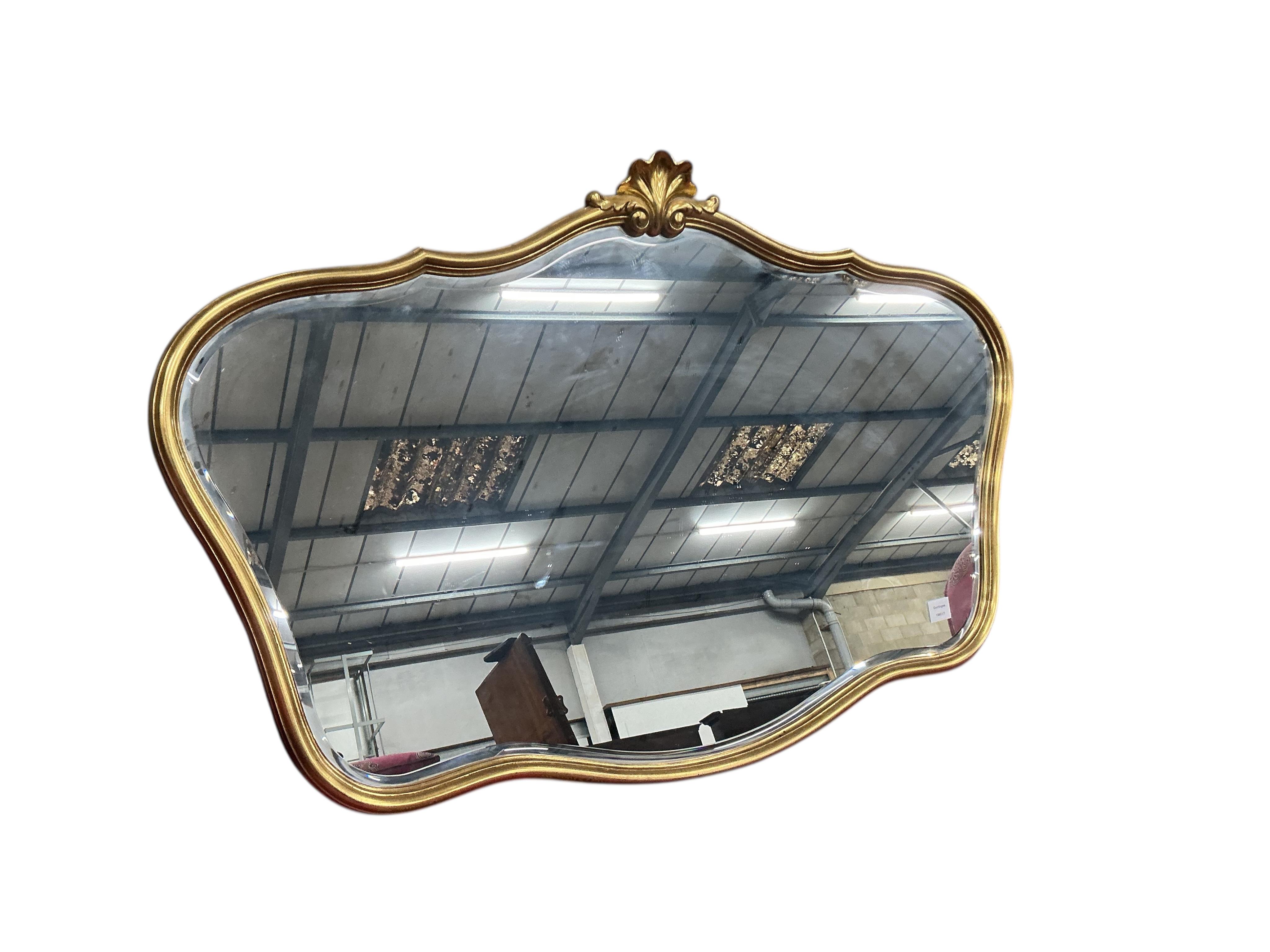 A reproduction Victorian style gilt composition wall mirror, width 120cm, height 80cm